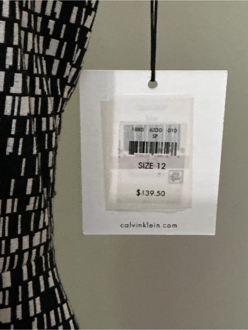 Calvin Klein Black and White Sleeveless Sheath Dress with Patterned Side Panels - Picture 3 of 4